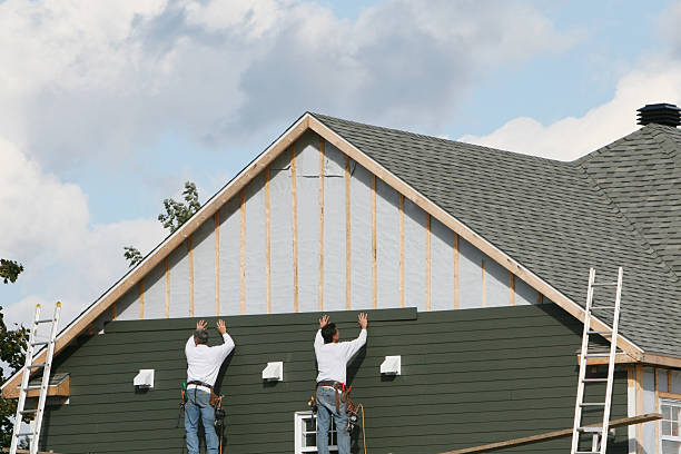 Professional Emergency Siding Repair technician working in Centerville, TN